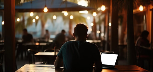 Young man using laptop with a cut out screen at sea resort. Remote work and business in palm paradise. Online purchase of air tickets and hotels. Copy space. Based on Generative AI