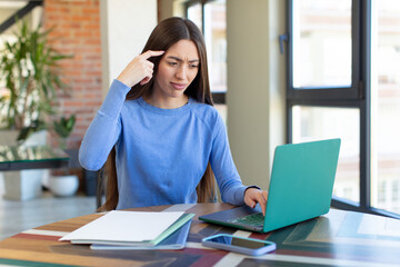 Poster - looking surprised, realizing a new thought, idea or concept. laptop and desk concept