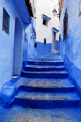 Sticker - Travel by Morocco. Street in medina of blue town Chefchaouen.