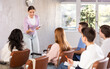 © JackF - While working in classroom, teacher answers questions that students had while studying new lesson