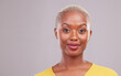 © Chanel M/peopleimages.com - Portrait, skincare and black woman with makeup, dermatology and confident girl against a grey studio background. Face, female person or happy model with facial cosmetics, luxury and shine with mockup