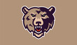 © kostymo - Bear mascot logo. Wild animal head logo with grin. Badge, sticker of a bear for a team, sports club. Isolated vector illustration.