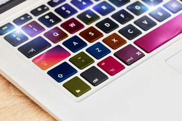 Poster - Laptop keyboard, color and technology for work, business and internet on a table. Digital, creative and pc computer for electronic entertainment, gaming or web on a desk for streaming and creativity
