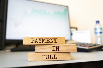 Poster - Wooden blocks with words 'Payment In Full'.