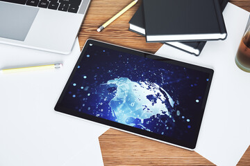 Poster - Top view of modern digital tablet monitor with abstract programming language hologram and world map, artificial intelligence and neural networks concept. 3D Rendering