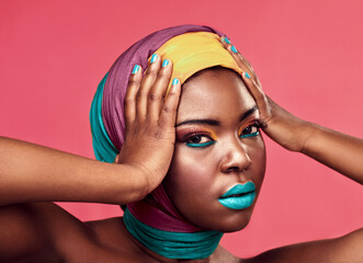 Makeup, beauty and scarf with portrait of black woman in studio for creative, art and culture. Fashion, cosmetics and natural with face of model isolated on pink background for african and color