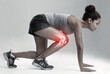 © Ashiq J/peopleimages.com - Woman, running and start with knee x ray for injury, workout or sport accident against a gray studio background. Female runner in skeleton pain with sore leg, ache or bone from exercising or training