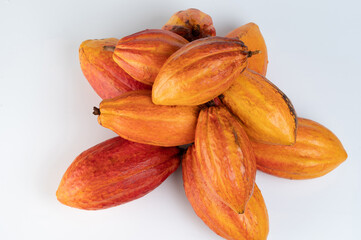 Wall Mural - Stack of orange color cacao pods