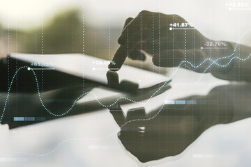 Poster - Multi exposure of abstract statistics data hologram interface and hand working with a digital tablet on background, computing and analytics concept