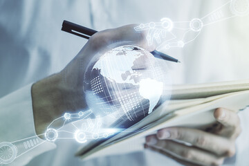 Aufkleber - Creative abstract robotics technology hologram with globe and man hand writing in diary on background, artificial intelligence and machine learning concept. Multi exposure