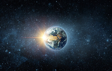 Wall Mural - panoramic view of the earth, sun, star and galaxy. sunrise over planet earth, view from space. eleme