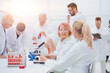 group of doctors and scientists work in the laboratory.
