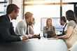 © Thurstan H/peopleimages.com - Meeting, finance and statistics with a business woman giving a presentation to her team in the boardroom. Laptop, stock market or accounting with a female manager talking to a group of people at work