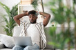 © Egoitz - Worried black man looking at laptop