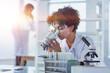 © ASDF - Female Scientist Working in The Lab