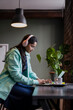 © Cultura Creative - Female student using laptop while studying