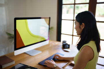 Fototapete - Graphic designer working on digital tablet and computer. Designer Asian Woman artist drawing on graphic tablet  Artist Creative Designer sketch graphic drawing creative