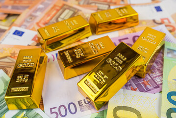 Poster - Euro banknotes and gold bars.