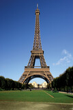 Fototapeta Paryż - The incredible Eiffel Tower in Paris on a warm summer day.