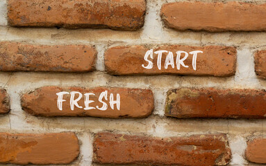 Wall Mural - Fresh start and motivational symbol. Concept words Fresh start on beautiful red brown brick wall on beautiful red brown brick wall background. Business motivational and Fresh start concept. Copy space