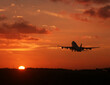 © Designpics - Boeing 747 Plane taking off at sunset time in The Netherlands. Typical Travel picture.