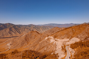 Wall Mural - Aerial view Autumn landscape travel of Altai mountains Russia meander road