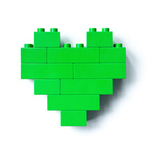 Green Heart From Lego Blocks Isolated On White Background, Top View Object, Design Element, Figure Heart From Child Lego Construction. Love Concept, Valentines Card, Toys, Games