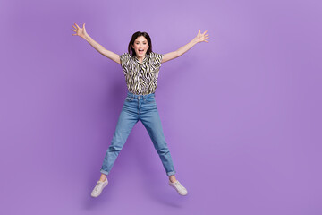 Sticker - Full body portrait of sportive nice lady jumping raise hands make star figure empty space isolated on purple color background