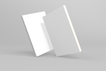 2 softcover book mockups are standing on a gray background, designed with 3D render visual effects that are indistinguishable from reality. A mockup, with flashy white covers resembling a real book.