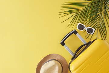 summer getaway concept. top view flat lay of stylish suitcase, sunhat, trendy sunglasses and palm le