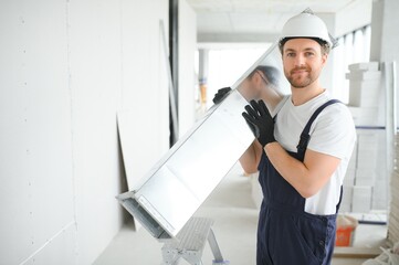 Wall Mural - hvac services - worker install ducted pipe system for ventilation and air conditioning