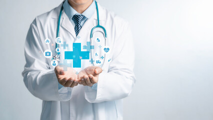 Male medicine doctor hold healthcare medical icons for the Health insurance concept in hospital background