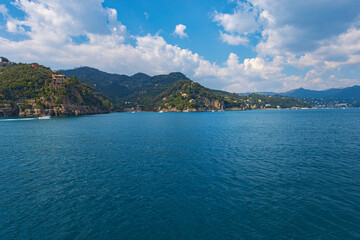 Wall Mural - Coast of the famous village of Portofino, with the bay of Paraggi and Santa Margherita Ligure town.Luxury tourist resorts in Genoa Province, Liguria, Italy, Europe.