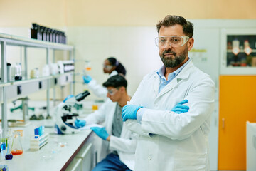 Wall Mural - portrait of confident scientist in laboratory looking at camera.