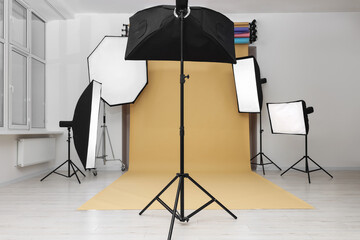 Canvas Print - Interior of modern photo studio with professional lighting equipment