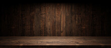 Old Planks Wall And Table With Light Empty Space. Vintage Wooden Background And Spotlight Showroom.