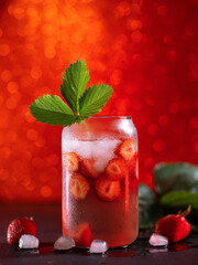 Wall Mural - strawberry cold lemonade on a red background. glass of tonic or cocktail