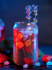 Wall Mural - craft lemonade or cocktail with strawberries and lavender. frozen glass