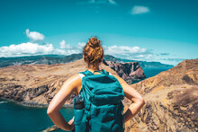 Athletic Woman Enjoys The View On The Madeiran Island From Hiking Trail. São Lourenço, Madeira Island, Portugal, Europe.
