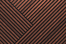 A Wall Of Wooden Slats In The Color Of Dark Wood With A Pattern Of Wall Panels In The Background