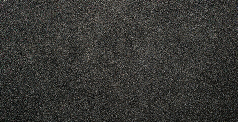 Beautiful black sandpaper picture with it's texture and background.