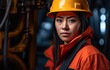 © Gelpi - Young, attractive, and empowered female engineer with orange safety vest. Generative AI