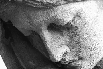  Close up statue of a woman on the tomb as symbol of pain and death.