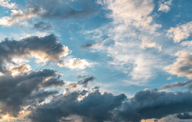 Wall Mural - beautiful bright summer sunset sky with clouds. sunset sky clouds background.