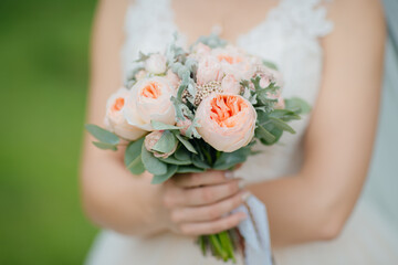 Wall Mural - bride holding bouquet