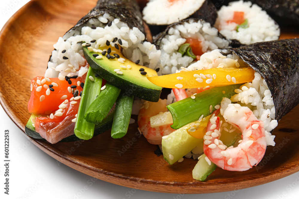 Wooden plate with delicious sushi cones on white background, closeup