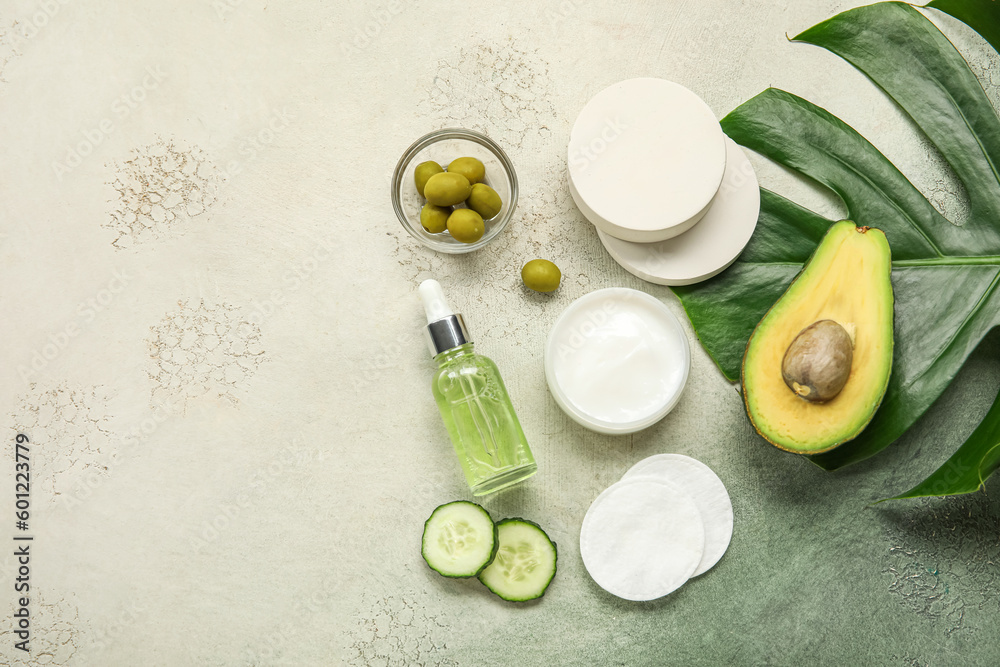 Composition with natural cosmetics and ingredients on grunge background