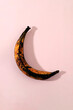 Over Ripe Rotten Banana on Pink Background