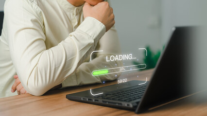Poster - Businessman using a laptop computer for download and update software and waiting to loading digital file data form website, very slow internet form wifi. Concept of waiting for load of loading symbol.