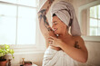 © Chanelle Malambo/peopleimages.com - Cleaning, armpit and woman in bathroom happy for smooth arms, healthy skin and wellness at home. Skincare, beauty and female person touch body for grooming, shower scent and hair removal for hygiene